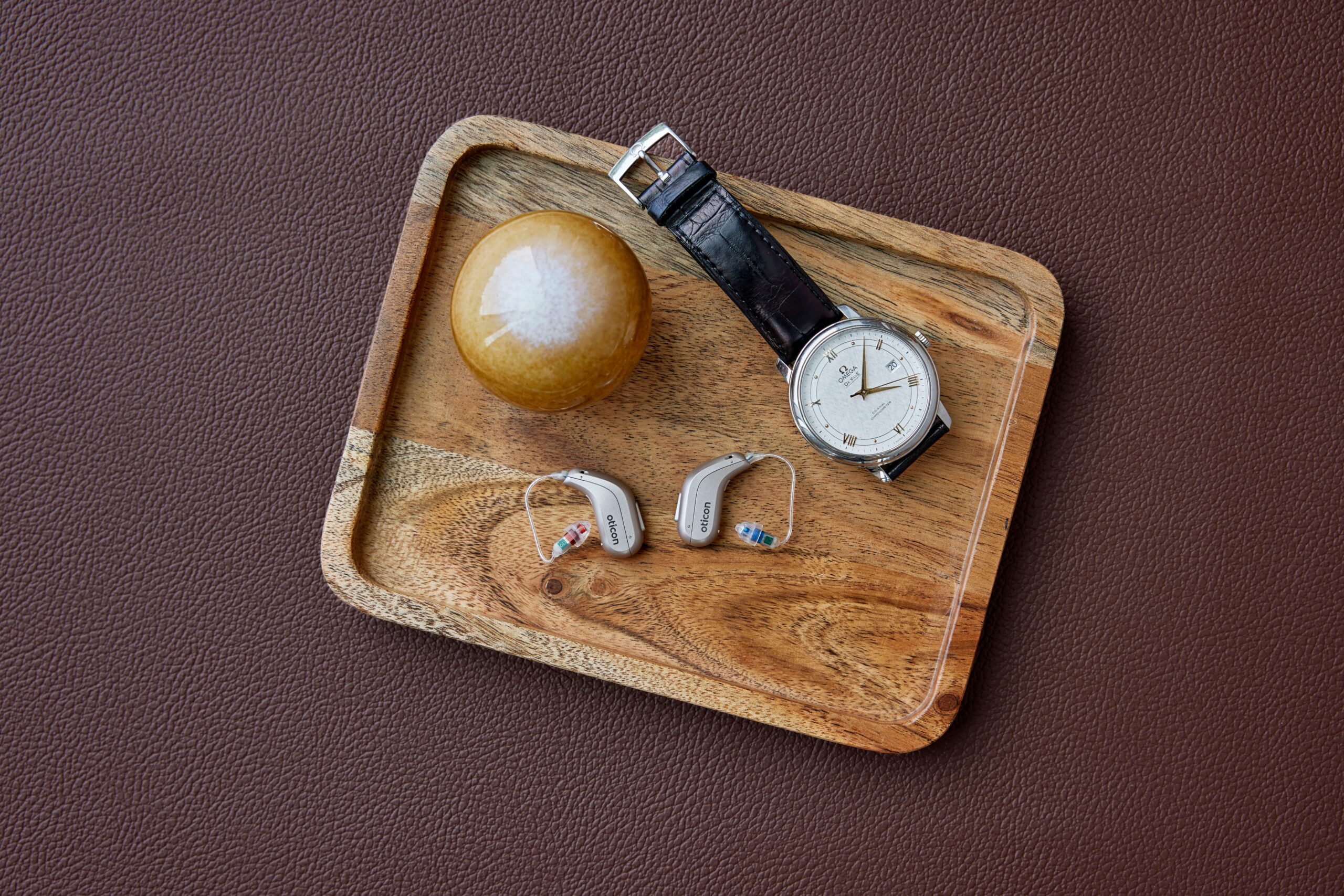 Oticon_Intent_Still_Life_miniRITE_Tray_Wrist_Watch_MS_0374-scaled